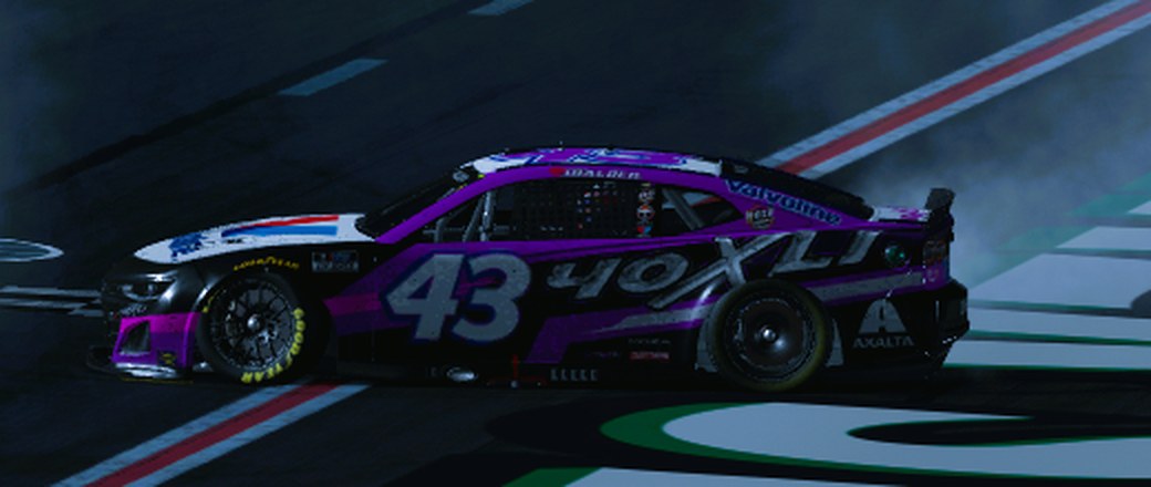 Purple, black and white 40XLI #43 Chevrolet Camaro doing a burnout at night