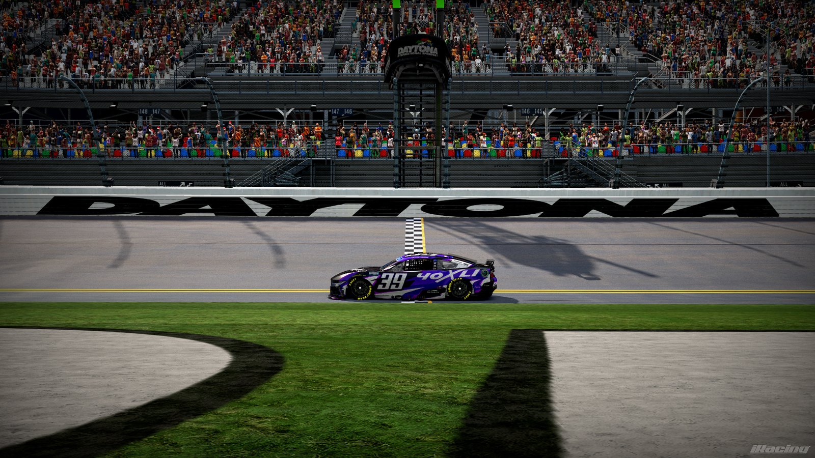 Purple and black 40XLI #39 Ford Mustang crossing the line at Daytona