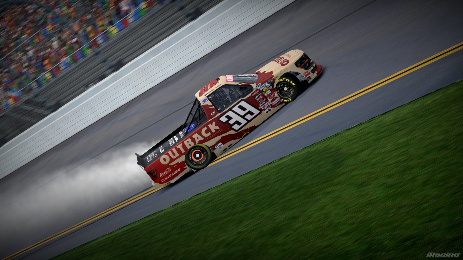 Tan and red Outback Steakhouse #39 Ford truck at Daytona